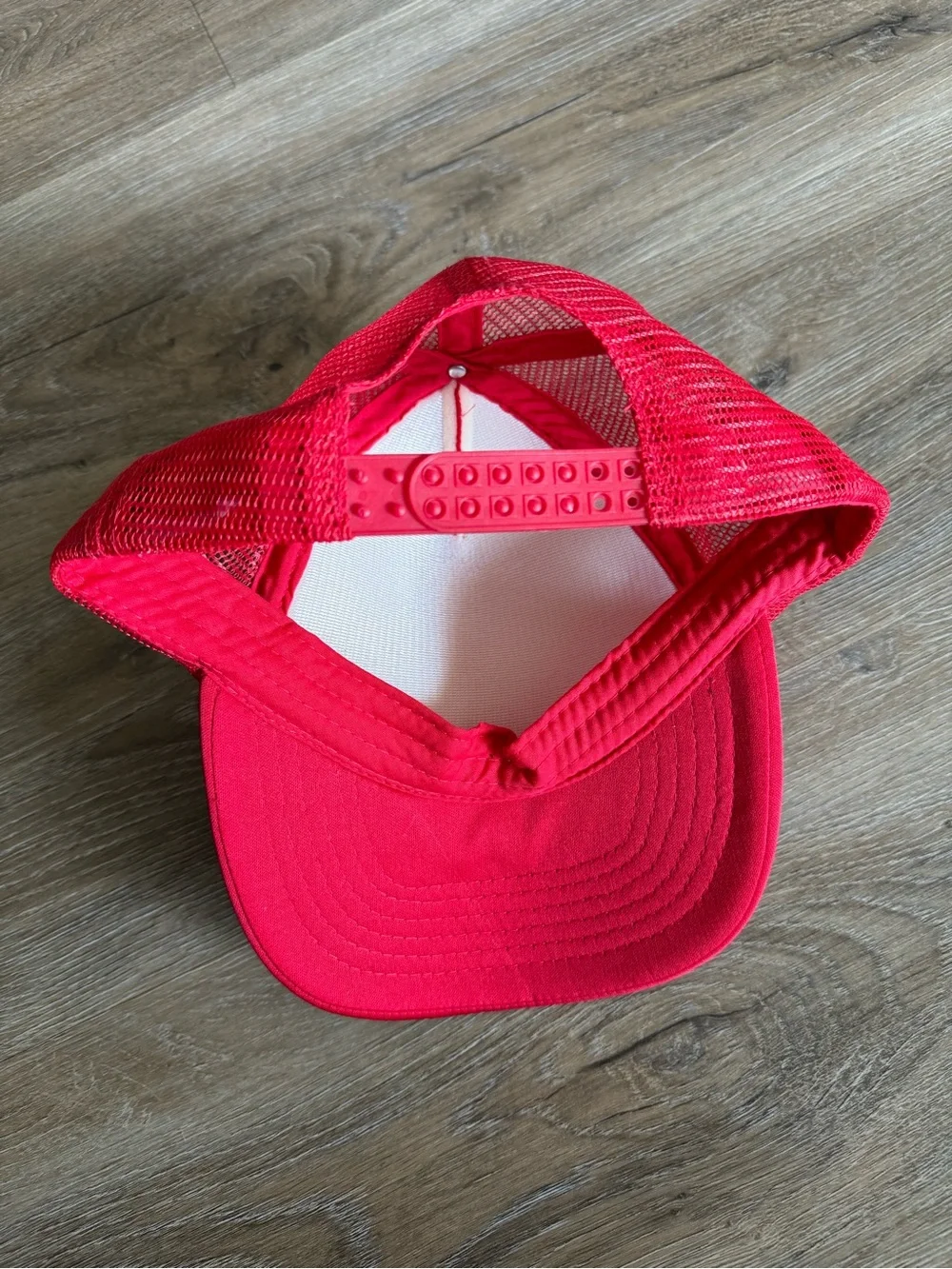 Red Trucker Hat with 'Make Milk Raw Again' Slogan